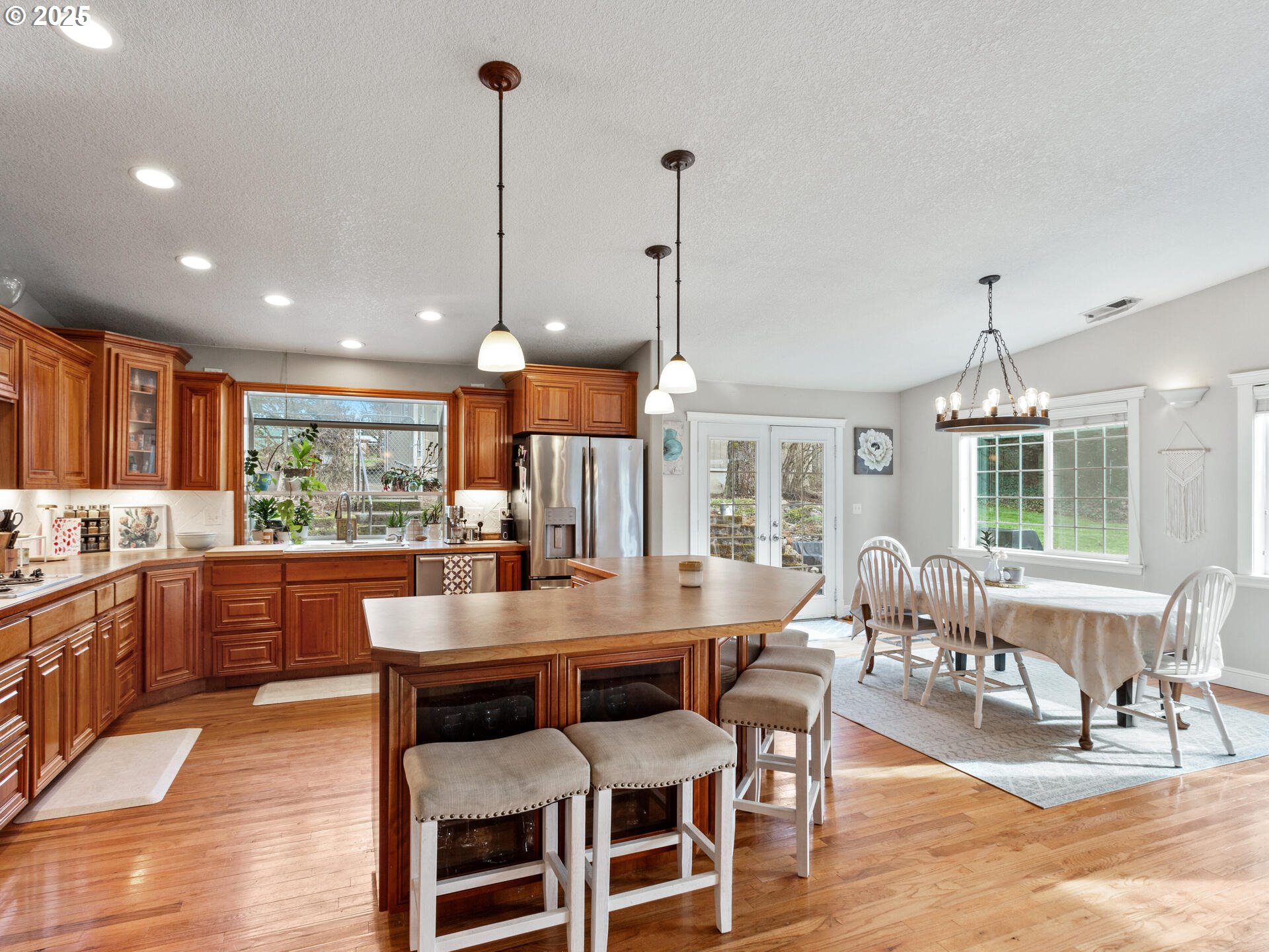 1621 Northeast 194th Street Ridgefield, WA 98642 - Photo 18 of 48 a large kitchen with a table and chairs