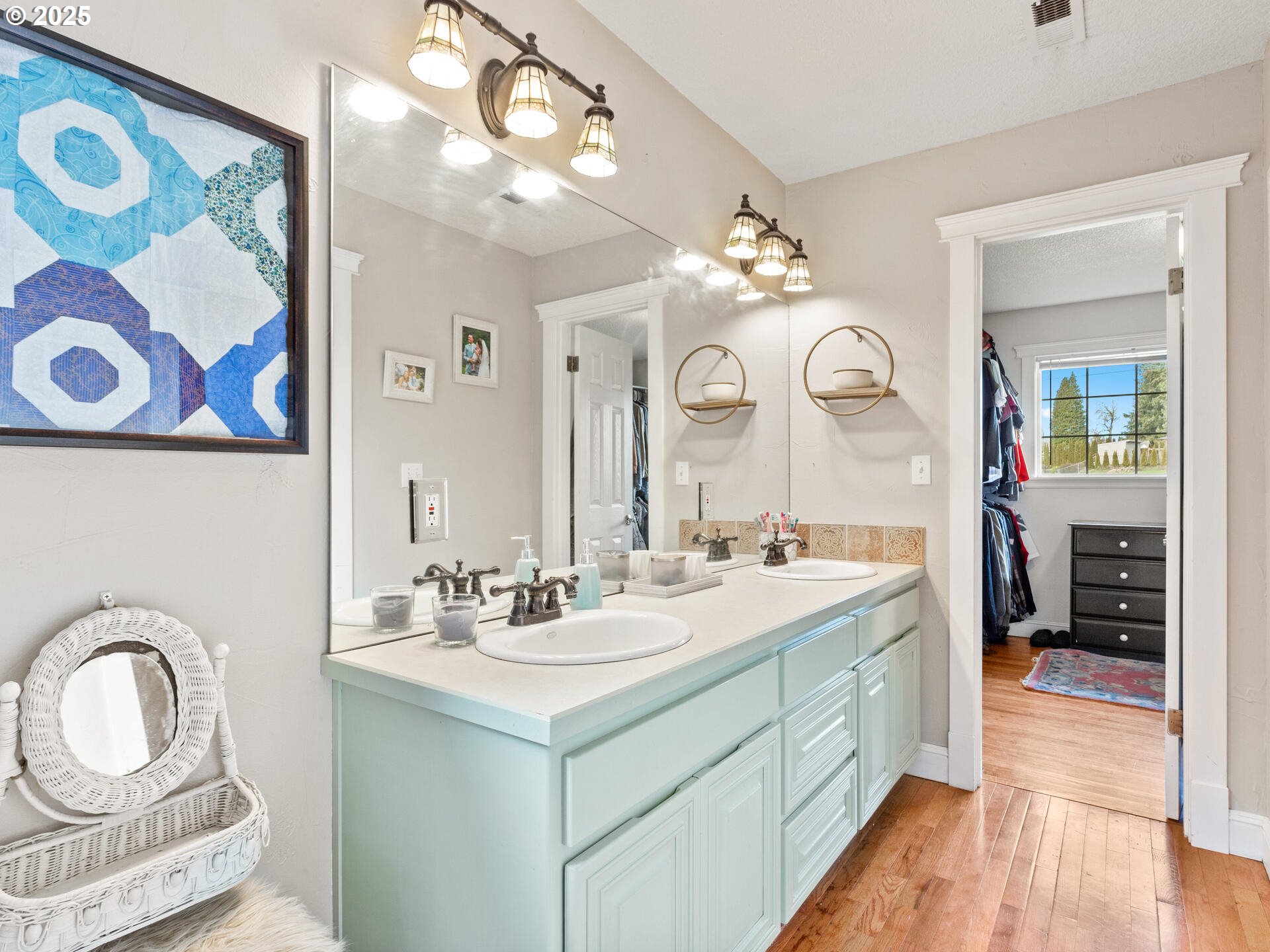 1621 Northeast 194th Street Ridgefield, WA 98642 - Photo 29 of 48 a spacious bathroom with a sink double vanity and a mirror