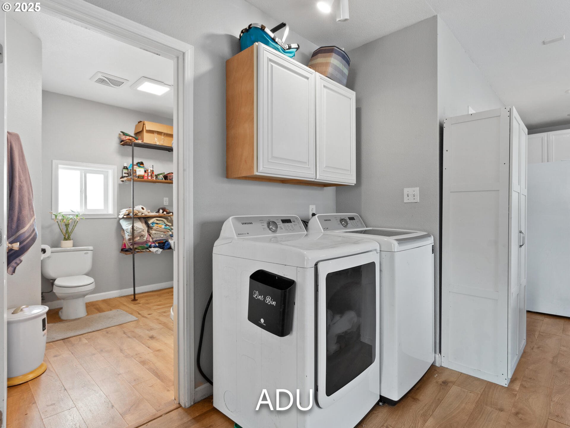 1621 Northeast 194th Street Ridgefield, WA 98642 - Photo 48 of 48 a utility room with sink dryer and washer