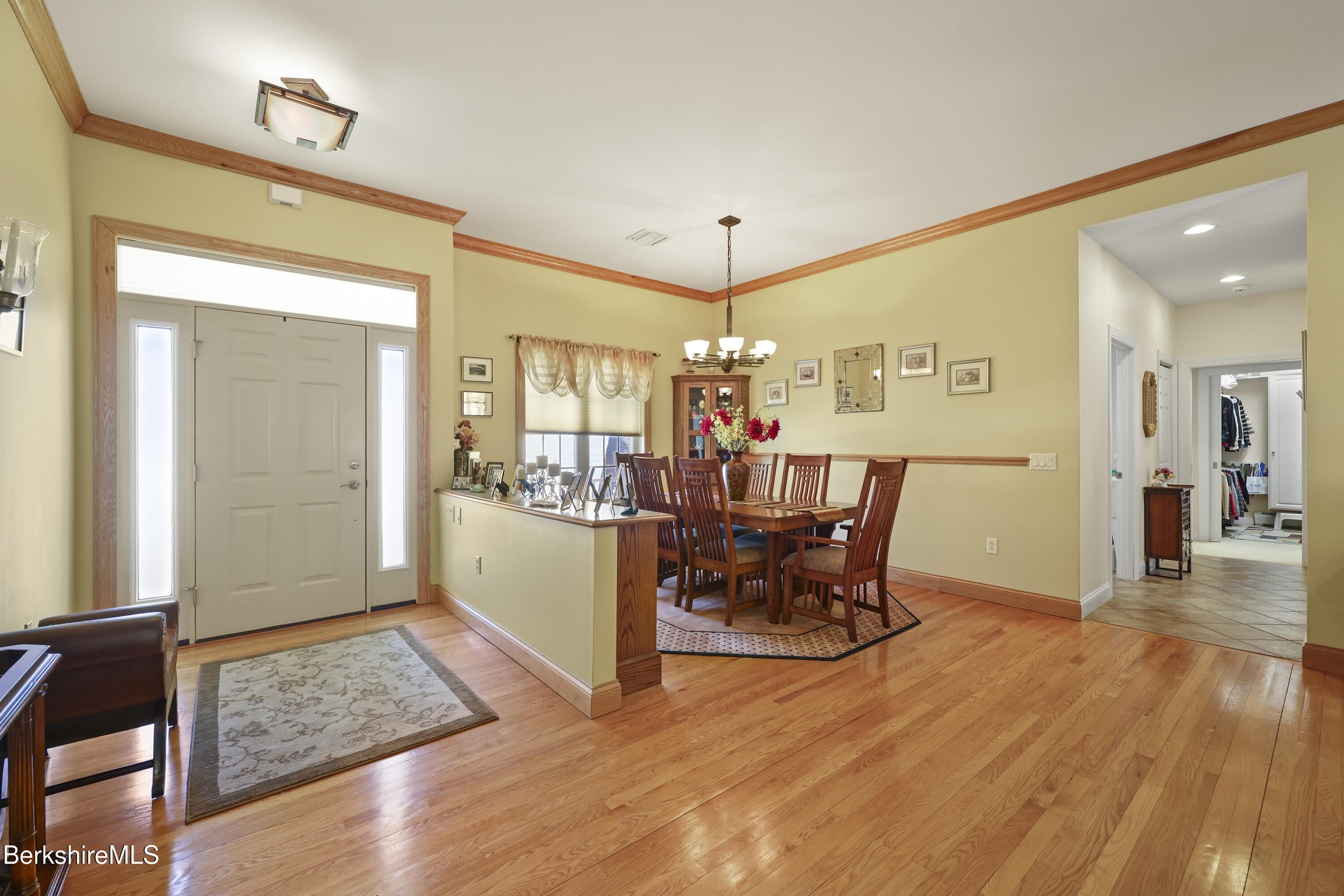 581 Red Barn Road Dalton, MA 01226 - Photo 11 of 65 a view of a dining room with furniture and wooden floor