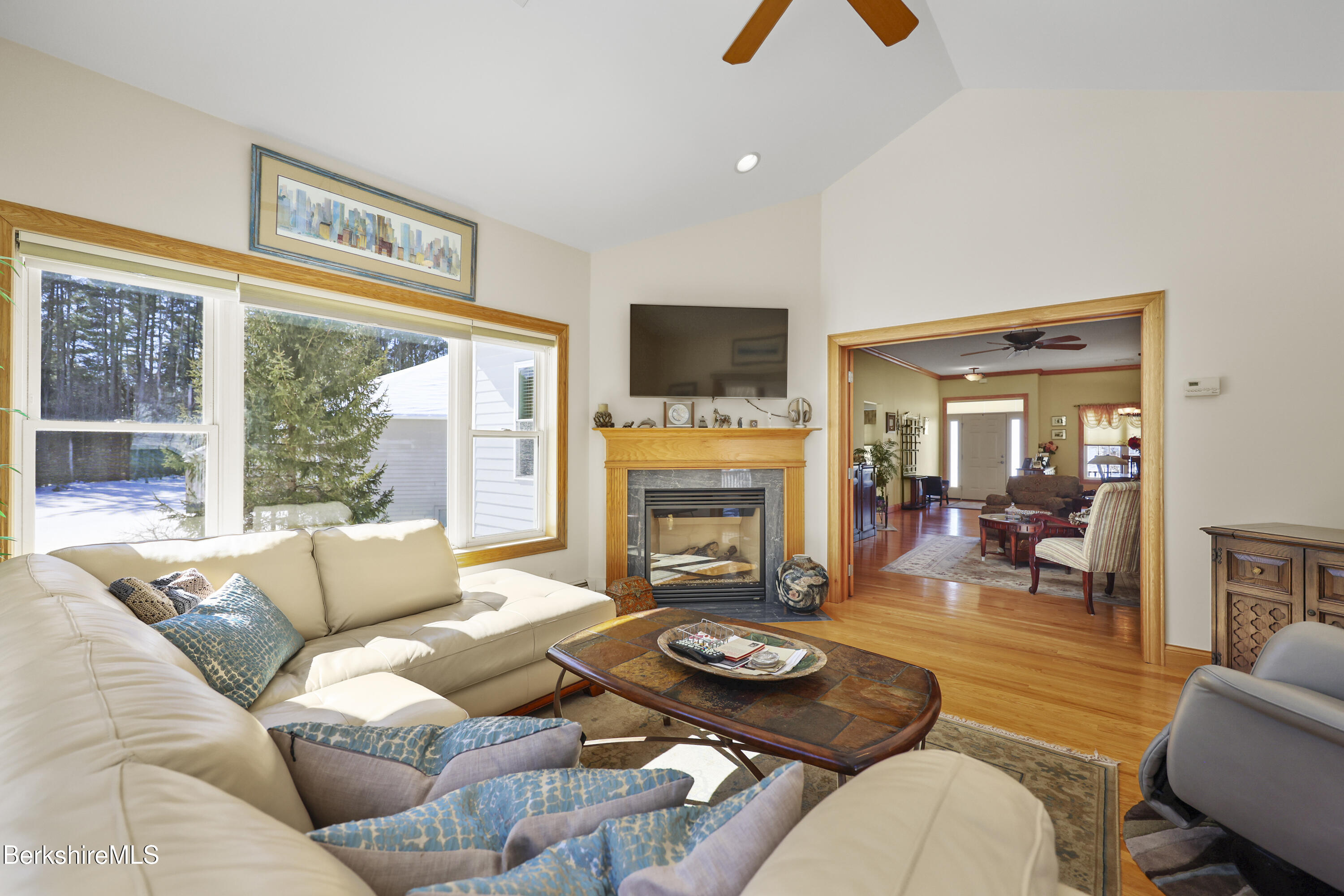 581 Red Barn Road Dalton, MA 01226 - Photo 23 of 65 a living room with furniture fireplace and a flat screen tv