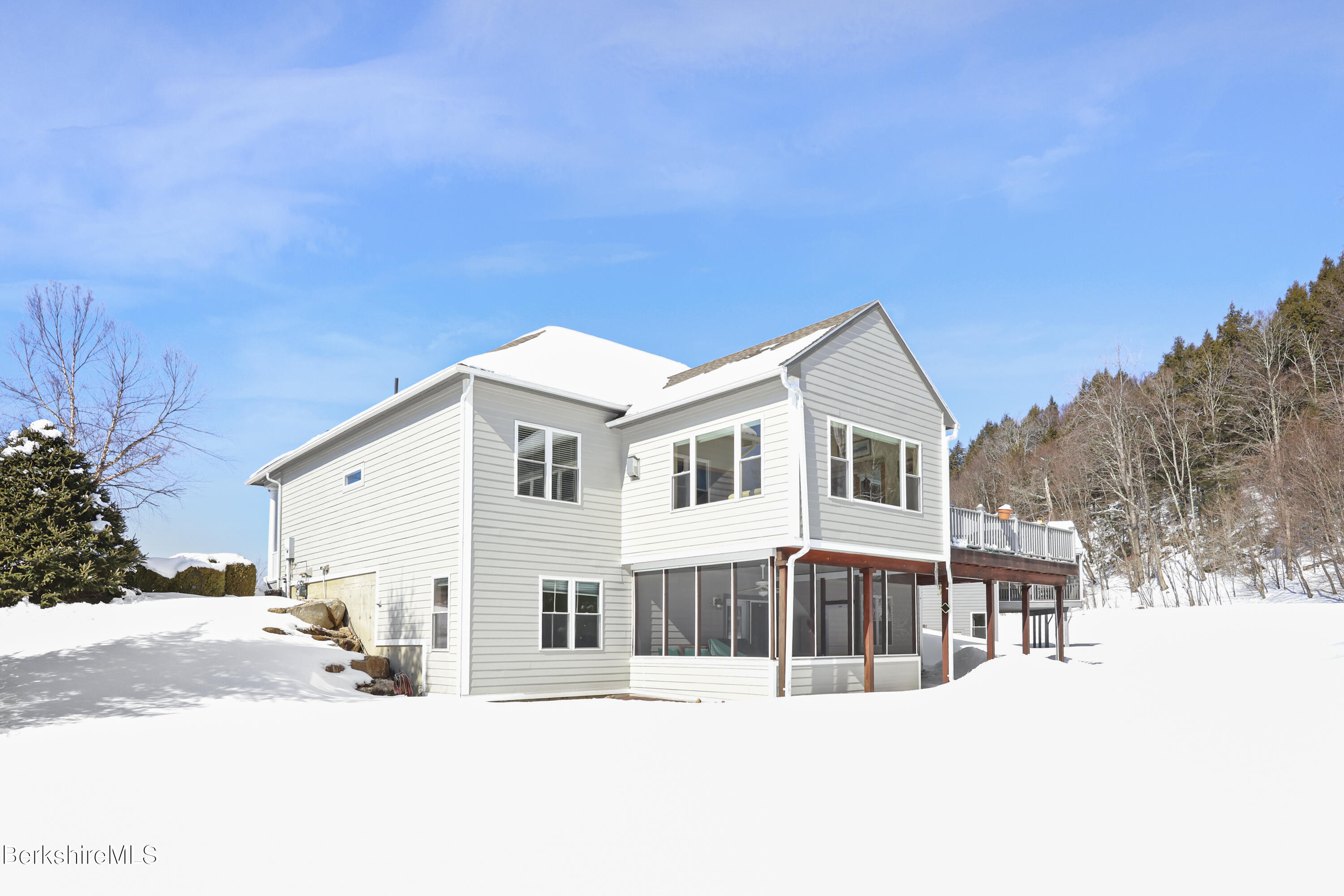 581 Red Barn Road Dalton, MA 01226 - Photo 4 of 65 a view of a white house with a yard