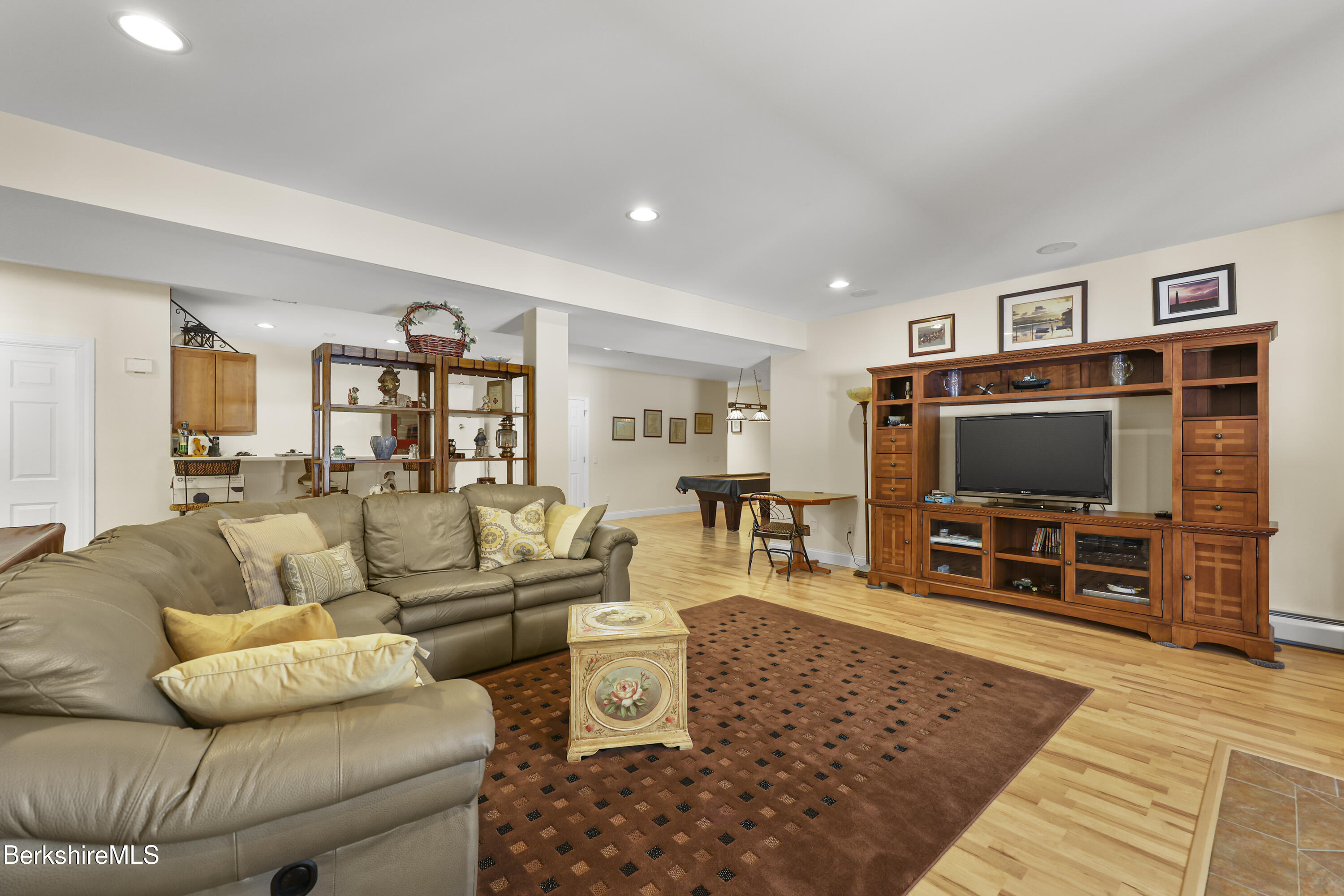 581 Red Barn Road Dalton, MA 01226 - Photo 48 of 65 a living room with furniture and a flat screen tv