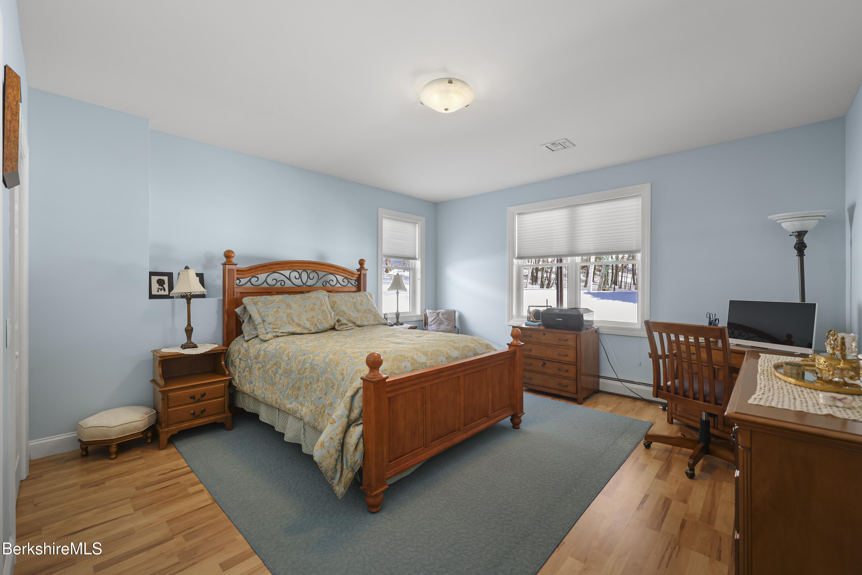 581 Red Barn Road Dalton, MA 01226 - Photo 50 of 65 a bedroom with a bed and a desk