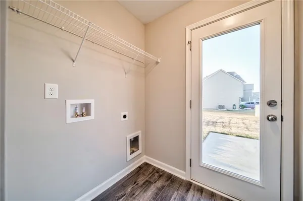 a view of a bathroom with a glass door and shower