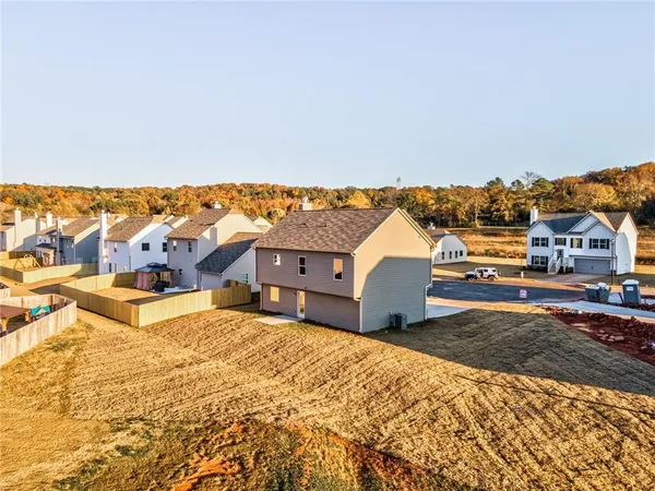a view of a house with a big yard