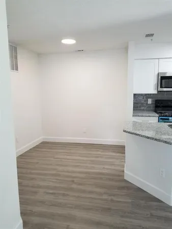 a view of kitchen and microwave