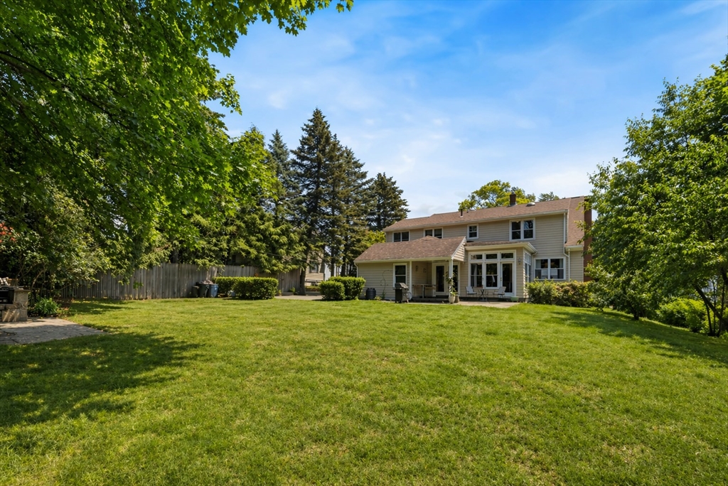 29 Boulevard Road Dedham, MA 02026 - Photo 33 of 34 a view of a house with a big yard