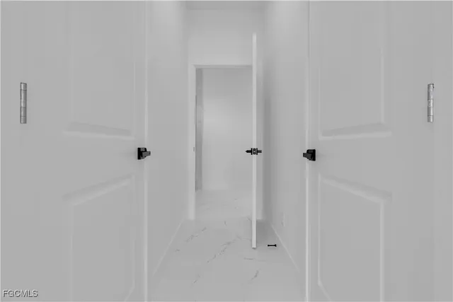 a bathroom with a double vanity sink and mirror