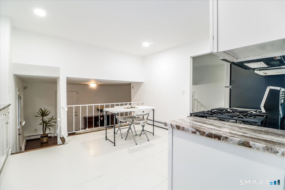 33 Hickory Hill Road Brookfield, CT 06804 - Photo 11 of 35 a dining room with furniture and a table