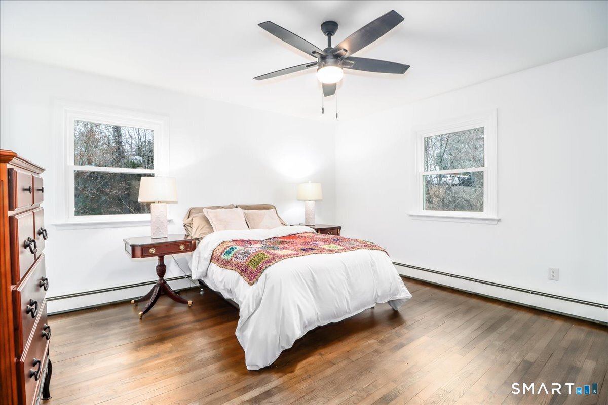 33 Hickory Hill Road Brookfield, CT 06804 - Photo 23 of 35 a bedroom with a bed and a window