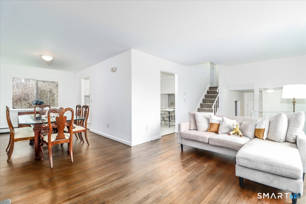 33 Hickory Hill Road Brookfield, CT 06804 - Photo 8 of 35 a living room with furniture and a wooden floor