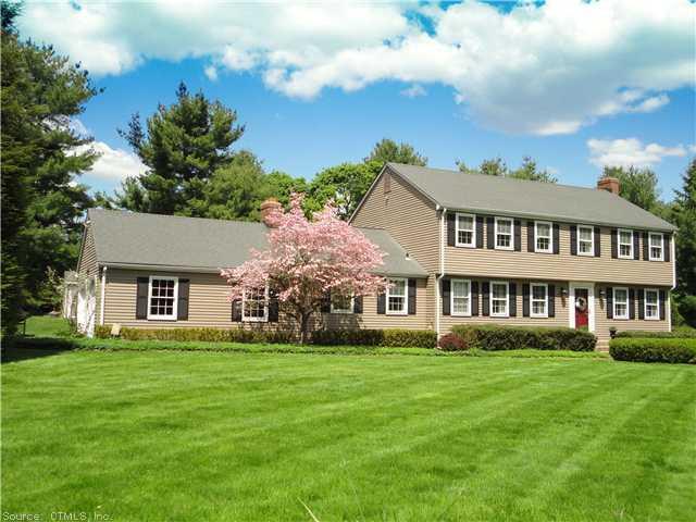 184 Farms Village Road Simsbury, CT 06092 - Photo 1 of 1 a front view of house with yard and green space
