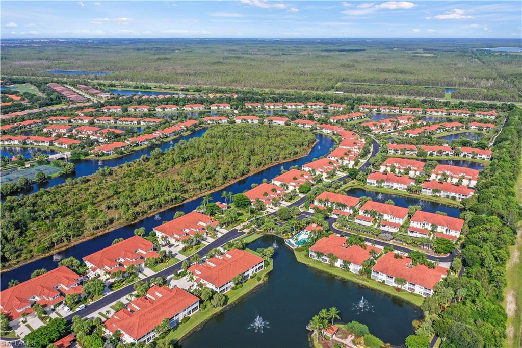 23810 Marbella Bay Road, Unit 203 Estero, FL 34135 - Photo 25 of 47 Aerial view featuring a water view