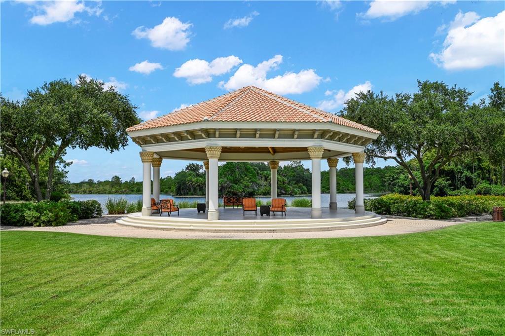 23810 Marbella Bay Road, Unit 203 Estero, FL 34135 - Photo 40 of 47 View of home's community featuring a gazebo, a yard, and a water view