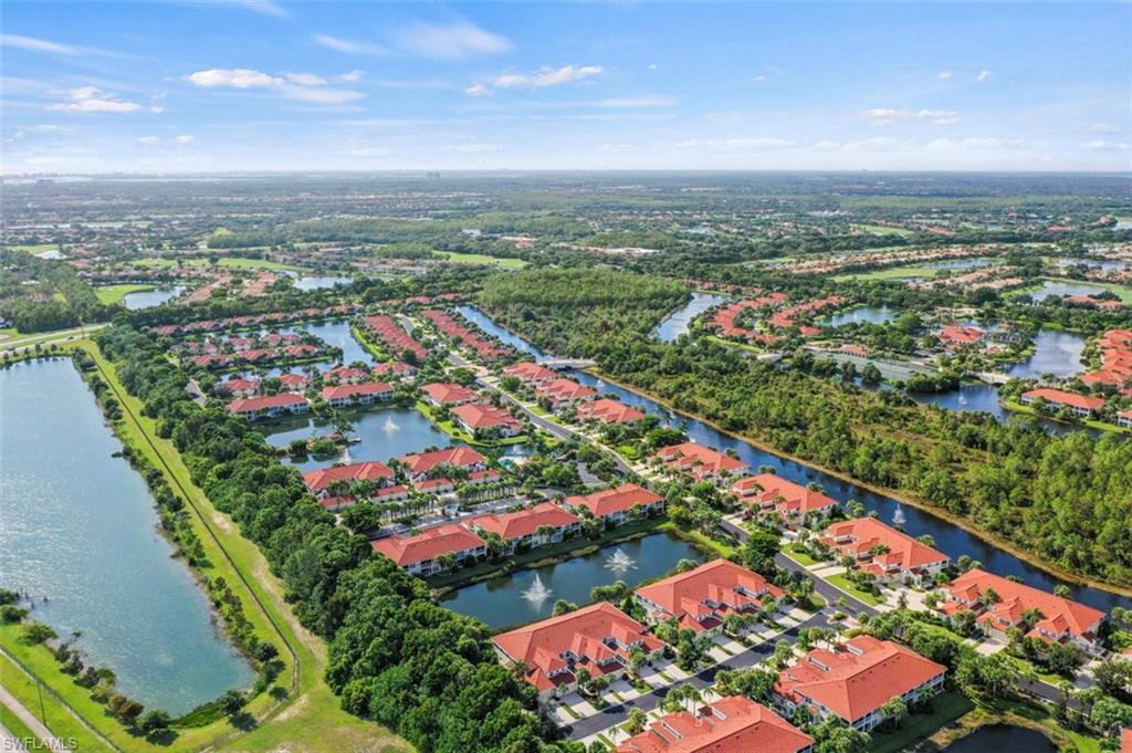 23810 Marbella Bay Road, Unit 203 Estero, FL 34135 - Photo 44 of 47 Birds eye view of property featuring a water view
