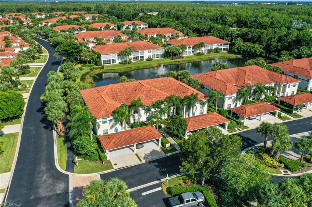 23810 Marbella Bay Road, Unit 203 Estero, FL 34135 - Photo 45 of 47 Birds eye view of property with a water view