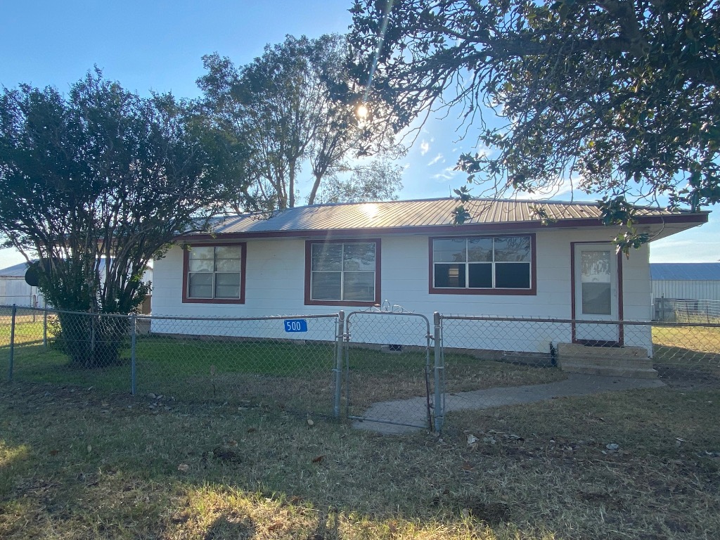 500 Greasy Bend Road Smithville, TX 78957 - Photo 15 of 18 a view of a house with a backyard