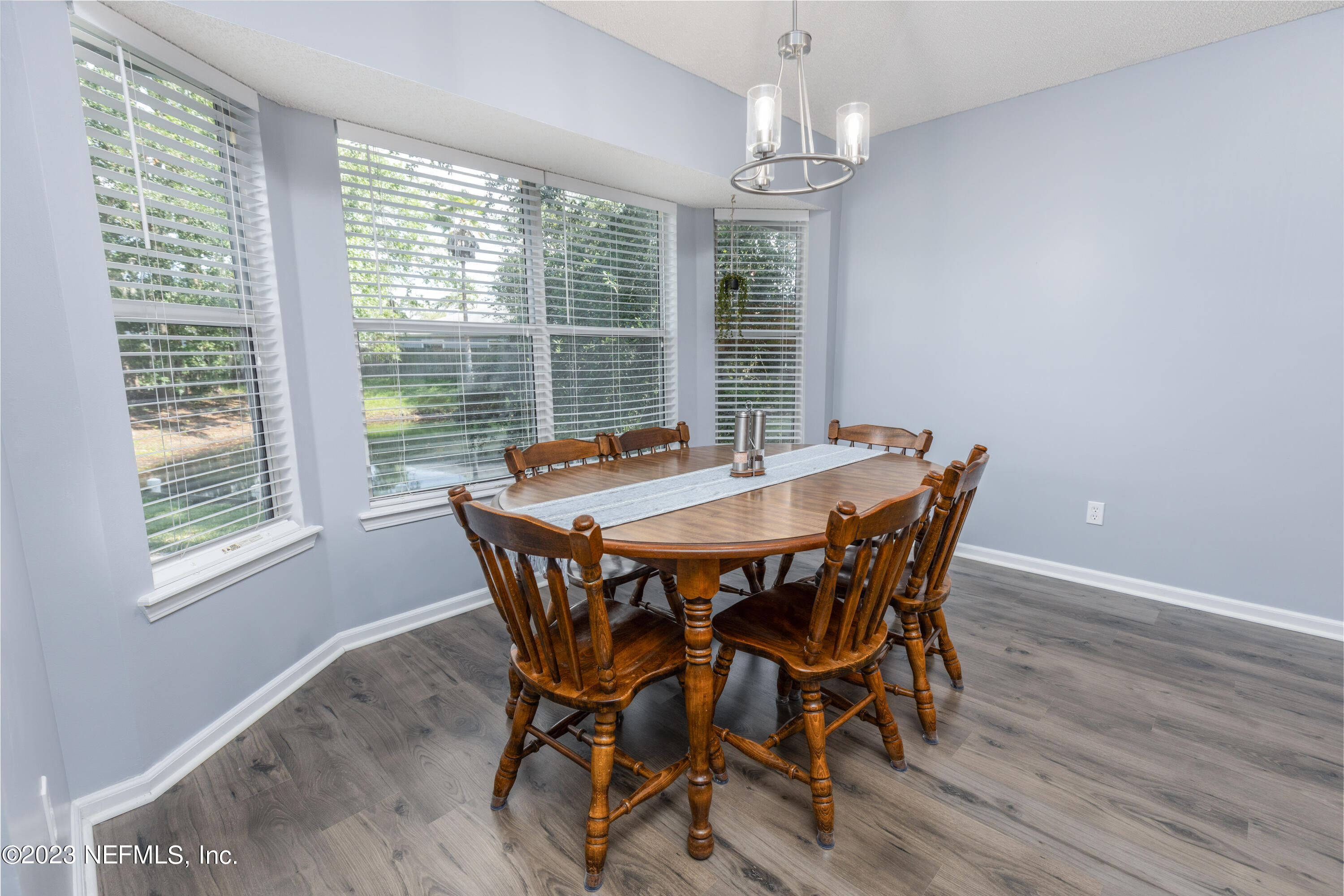 9698 Pritmore Road East Jacksonville, FL 32257 - Photo 7 of 28 a view of a dining room with furniture window and outside view