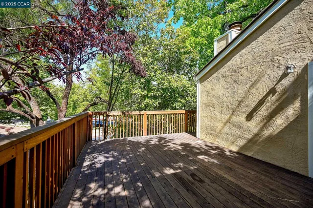 a balcony with trees