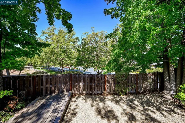 a view of a balcony with a pot