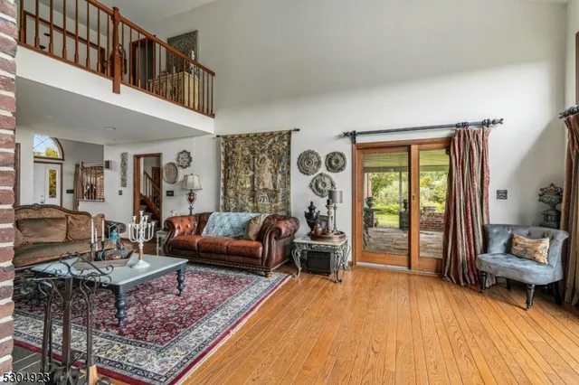 a living room with furniture and a rug