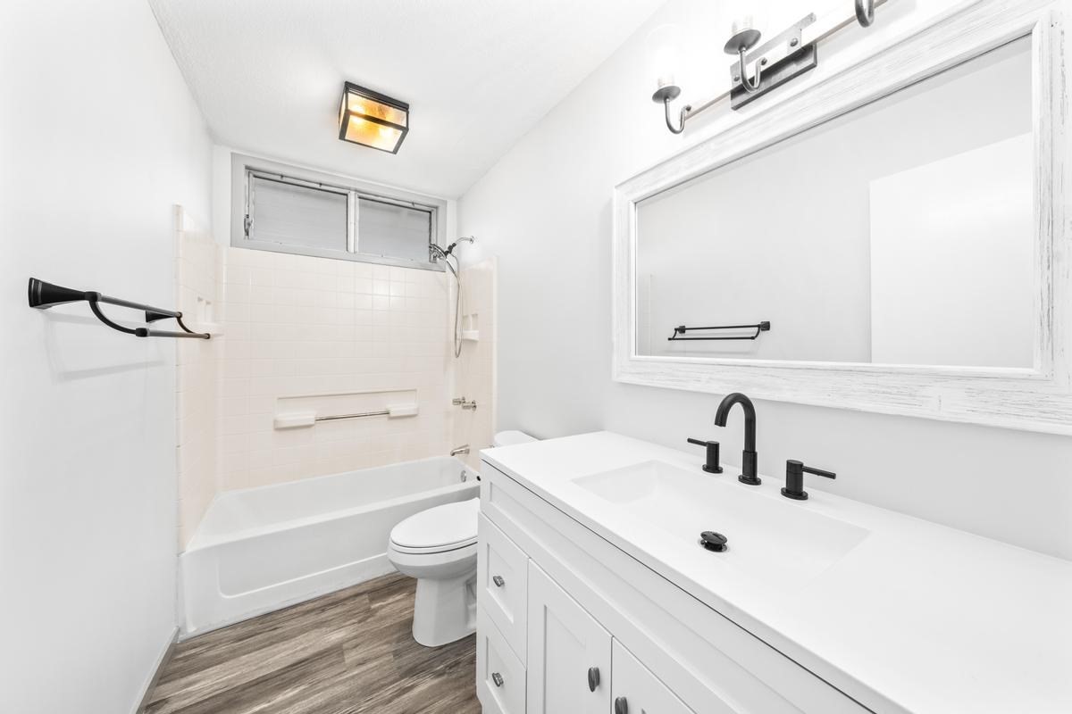 88-2259 Milolii Road Captain Cook, HI 96704 - Photo 17 of 30 a bathroom with a sink a toilet and shower