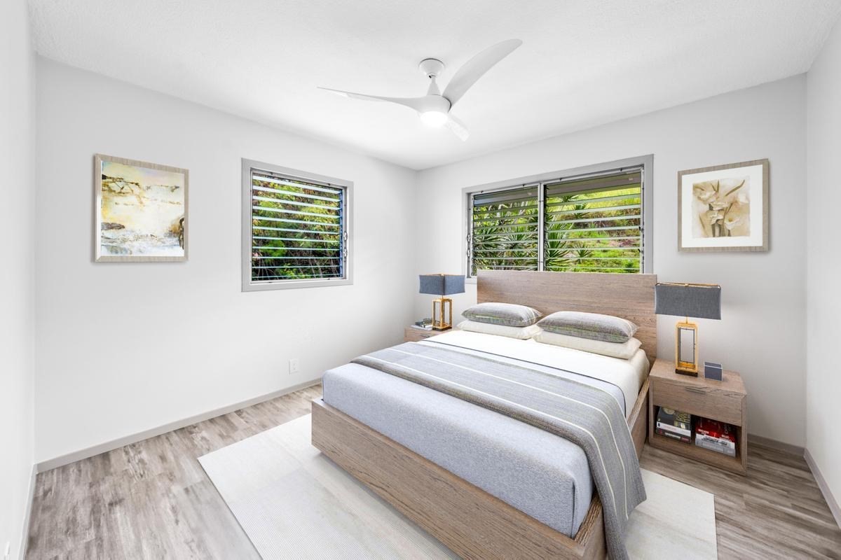 88-2259 Milolii Road Captain Cook, HI 96704 - Photo 18 of 30 a bedroom with a bed and a window