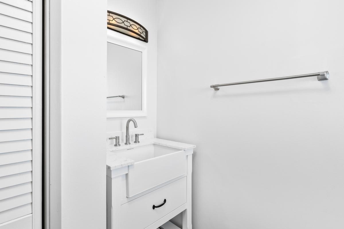 88-2259 Milolii Road Captain Cook, HI 96704 - Photo 20 of 30 a bathroom with a sink and a mirror