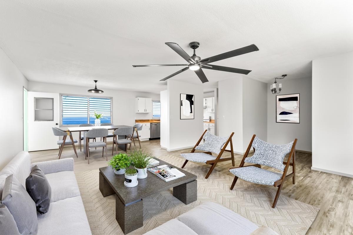 88-2259 Milolii Road Captain Cook, HI 96704 - Photo 2 of 30 a living room with furniture and a wooden floor