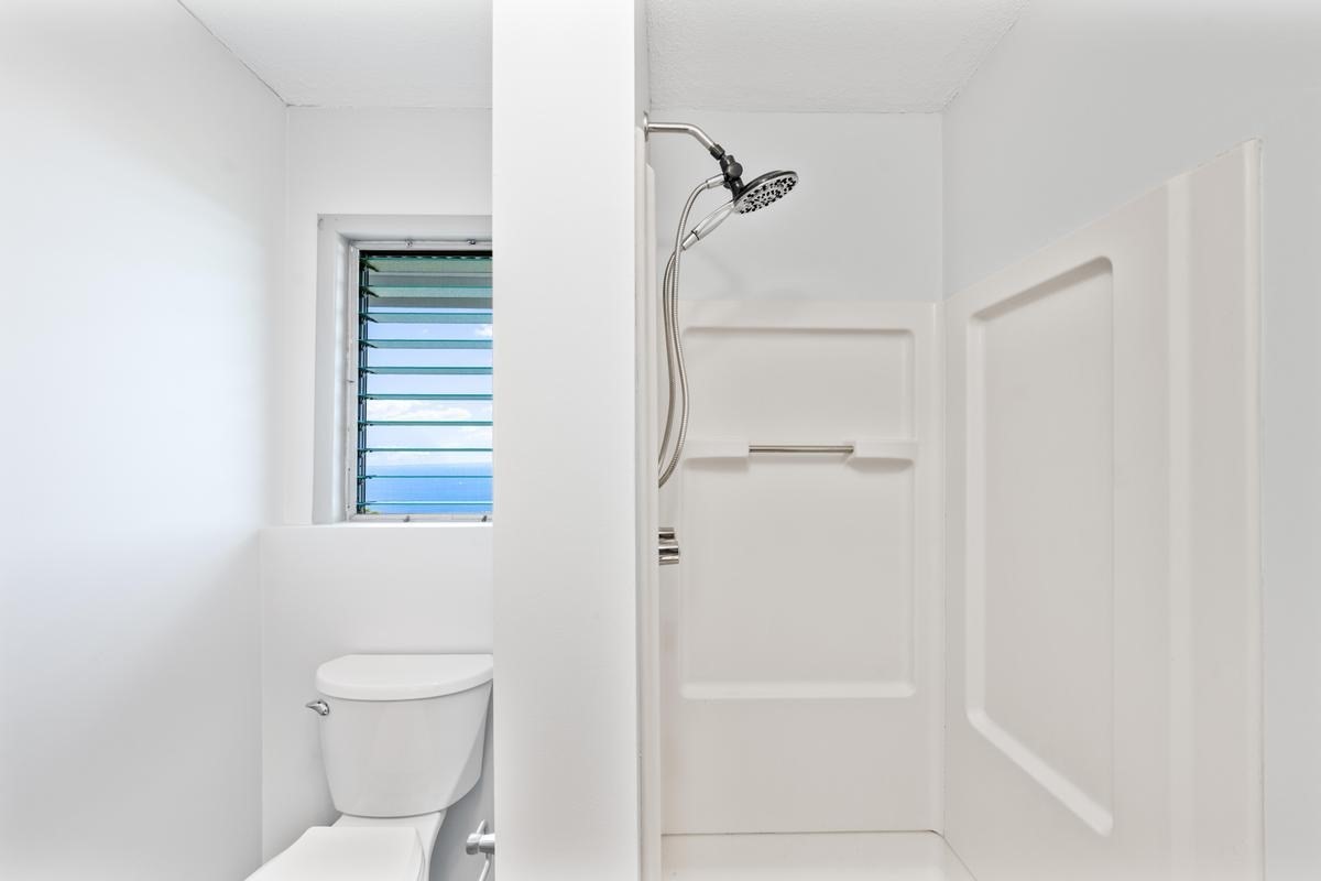 88-2259 Milolii Road Captain Cook, HI 96704 - Photo 21 of 30 a bathroom with a toilet and a shower