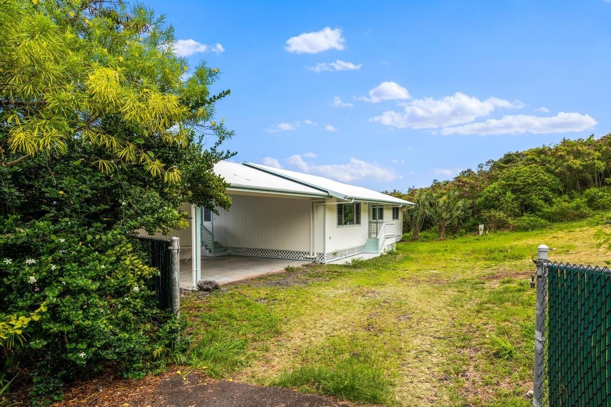 88-2259 Milolii Road Captain Cook, HI 96704 - Photo 26 of 30 a front view of a house with garden