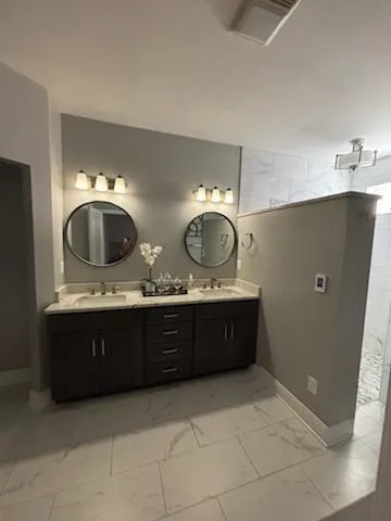 a kitchen with a wooden cabinets and stove top oven