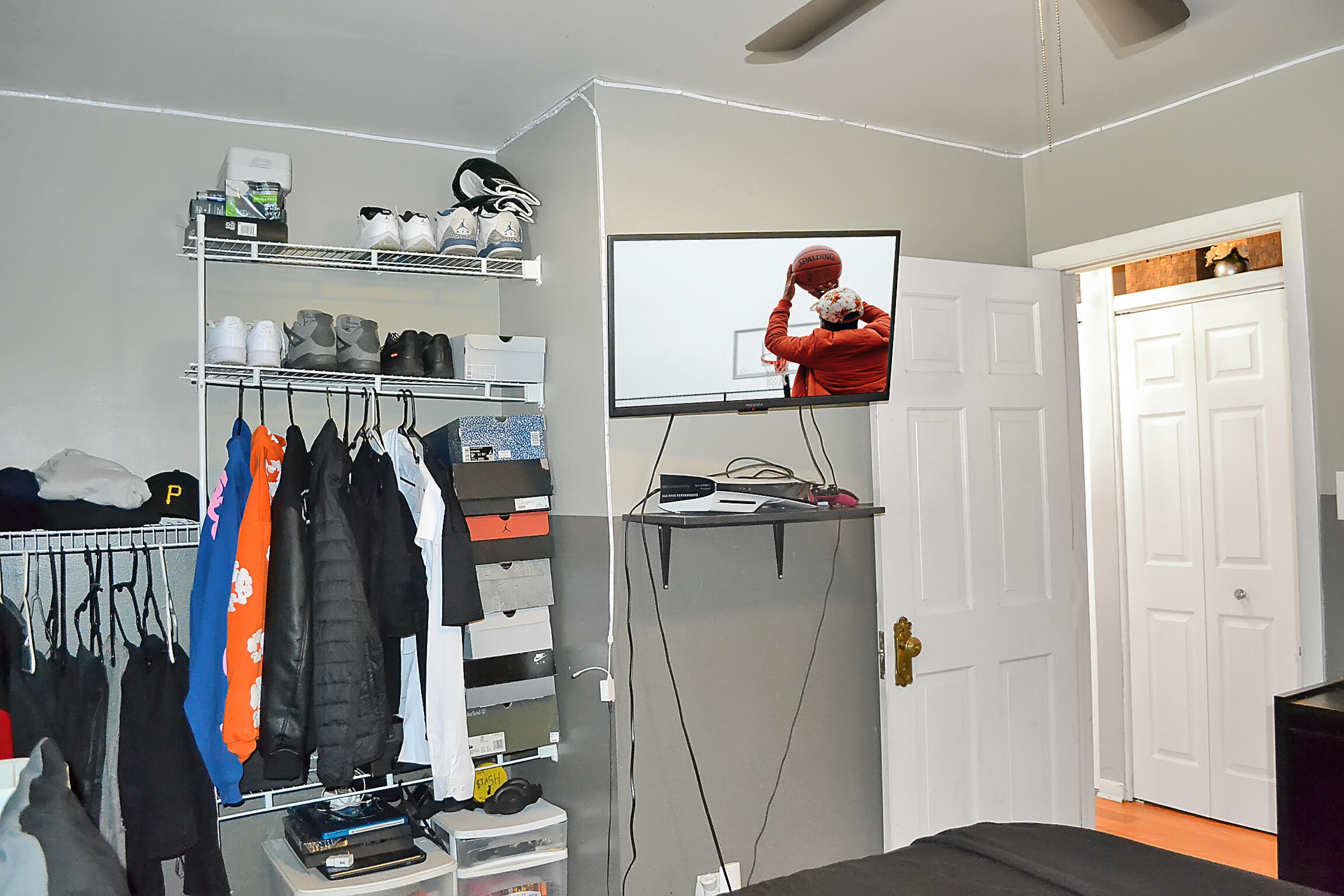 3718 173rd Court Hammond, IN 46323 - Photo 17 of 30 a view of walk in closet with clothes and shoes