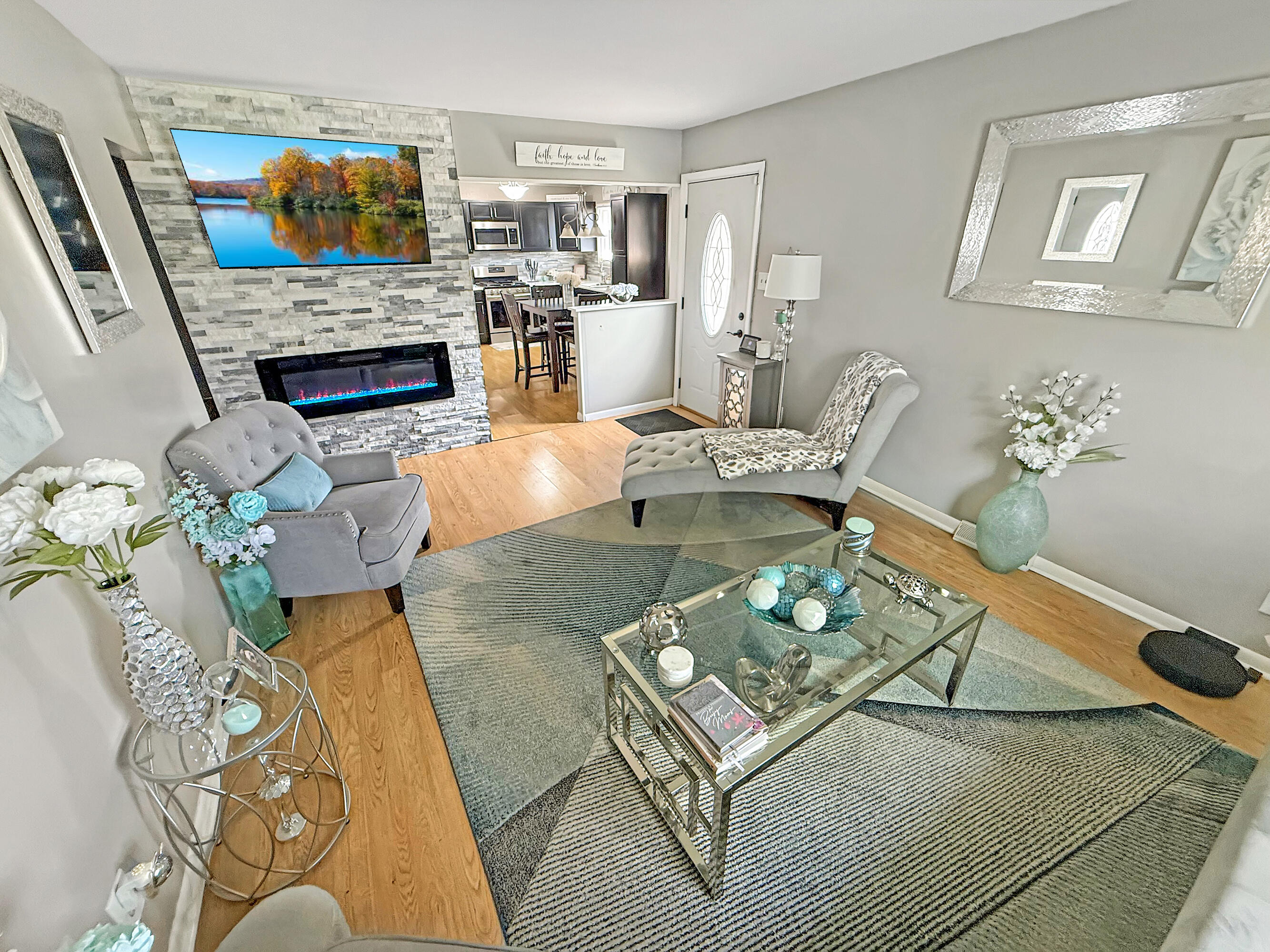 3718 173rd Court Hammond, IN 46323 - Photo 2 of 30 a living room with fireplace furniture and a fireplace