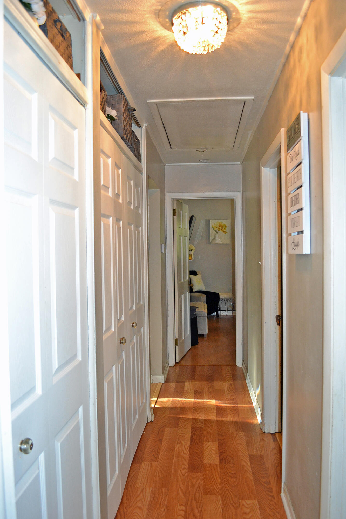 3718 173rd Court Hammond, IN 46323 - Photo 24 of 30 a view of a hallway with a livingroom and a window