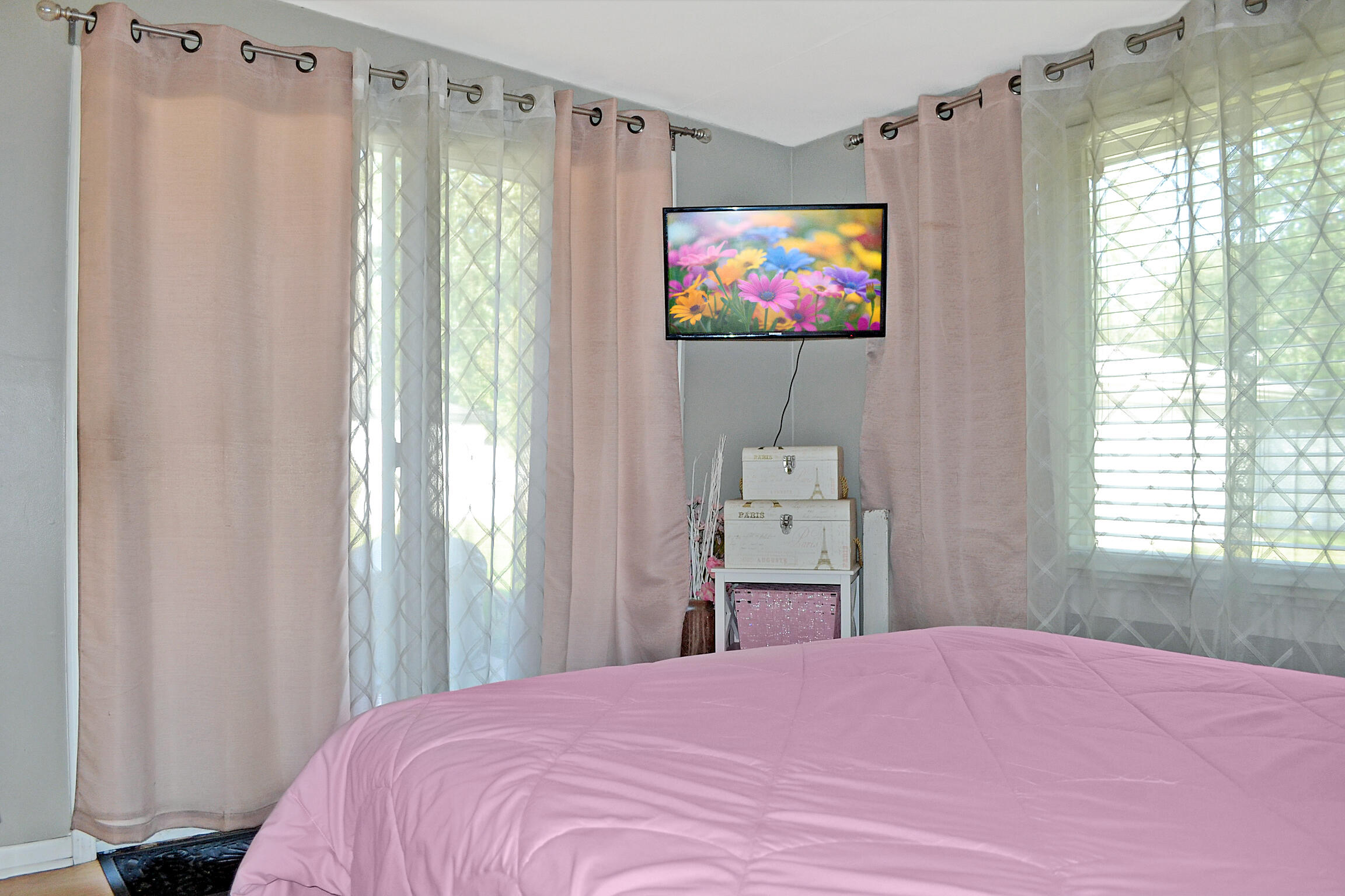 3718 173rd Court Hammond, IN 46323 - Photo 26 of 30 a bedroom with a bed and a flat screen tv