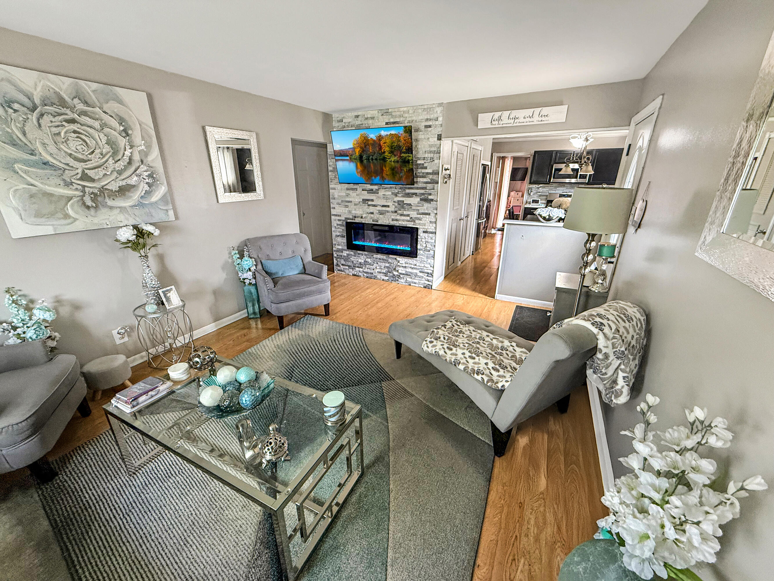 3718 173rd Court Hammond, IN 46323 - Photo 4 of 30 a living room with furniture and a fireplace