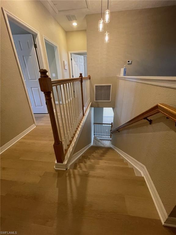 20013 Larino Loop Estero, FL 33928 - Photo 16 of 35 a view of an empty room with stairs