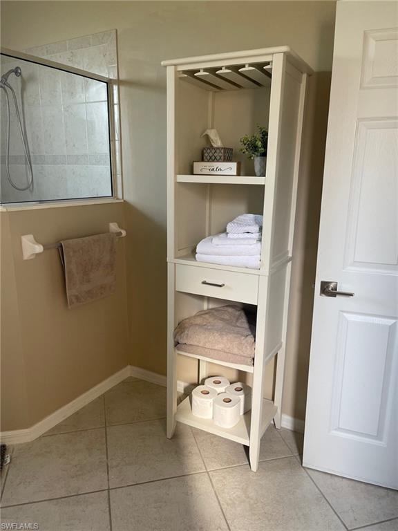 20013 Larino Loop Estero, FL 33928 - Photo 19 of 35 a bathroom with a shower