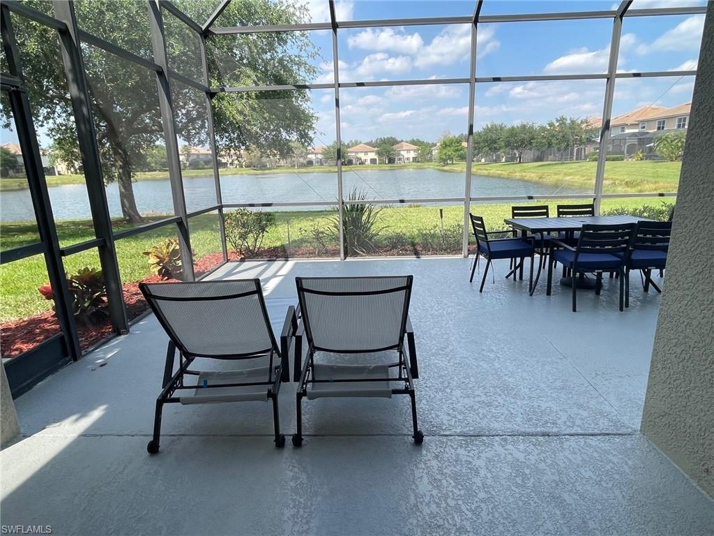 20013 Larino Loop Estero, FL 33928 - Photo 30 of 35 a view of a big yard with furniture and a porch