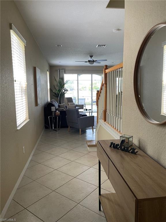 20013 Larino Loop Estero, FL 33928 - Photo 3 of 35 a living room with furniture and a window