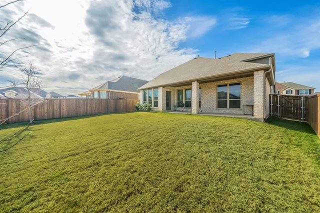 a house view with a garden space