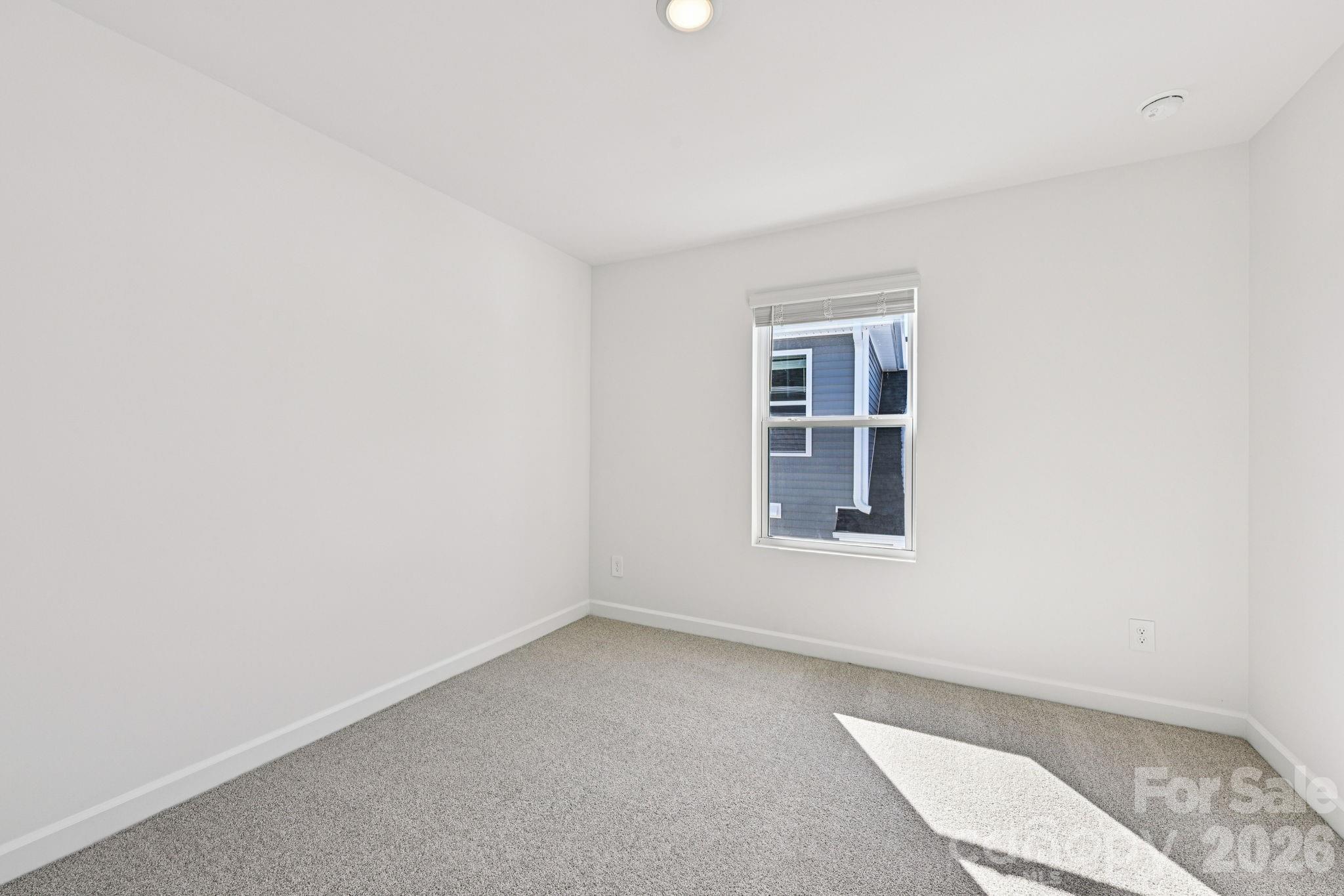 1281 30th St Lane Northeast Conover, NC 28613 - Photo 24 of 37 an empty room with a window