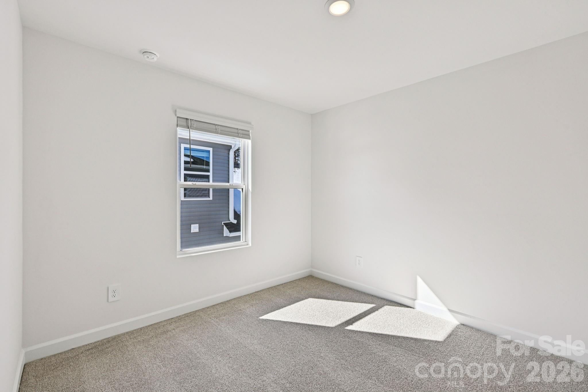 1281 30th St Lane Northeast Conover, NC 28613 - Photo 31 of 37 an empty room with a window