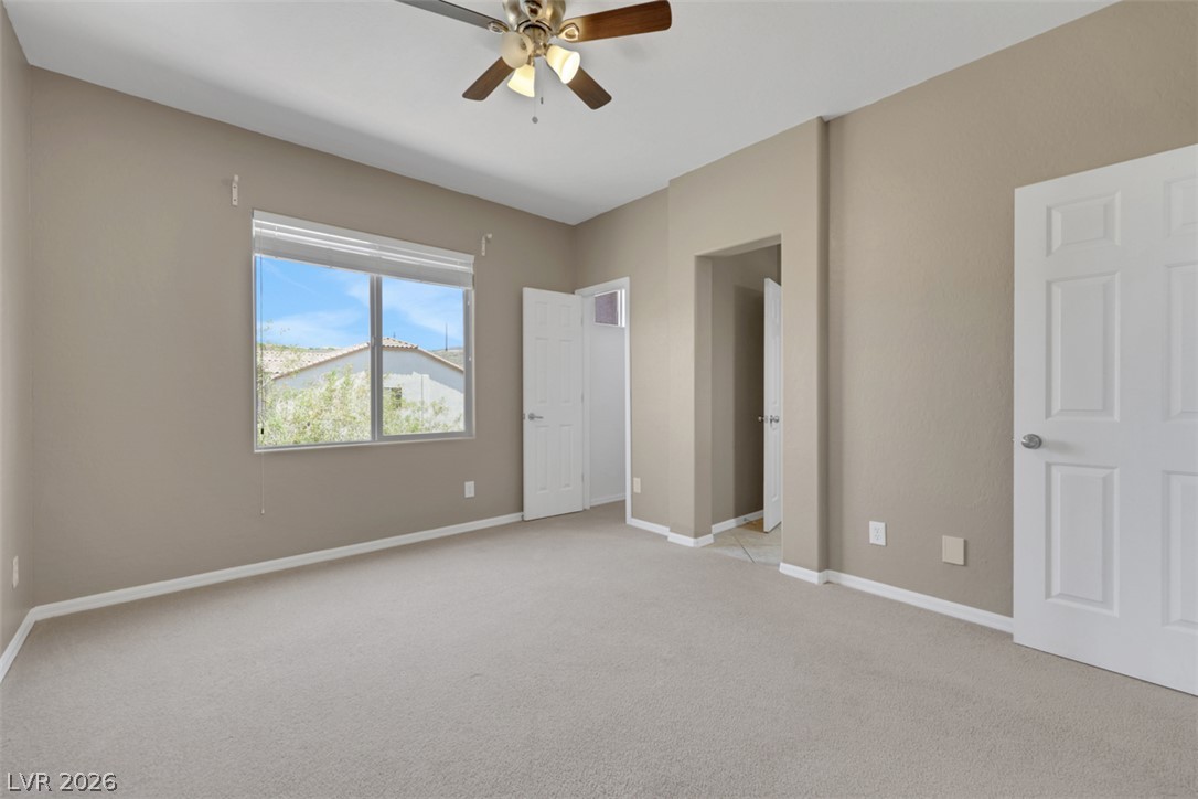 2501 Bechamel Place Henderson, NV 89044 - Photo 26 of 50 A quiet retreat with a window overlooking distant hills.