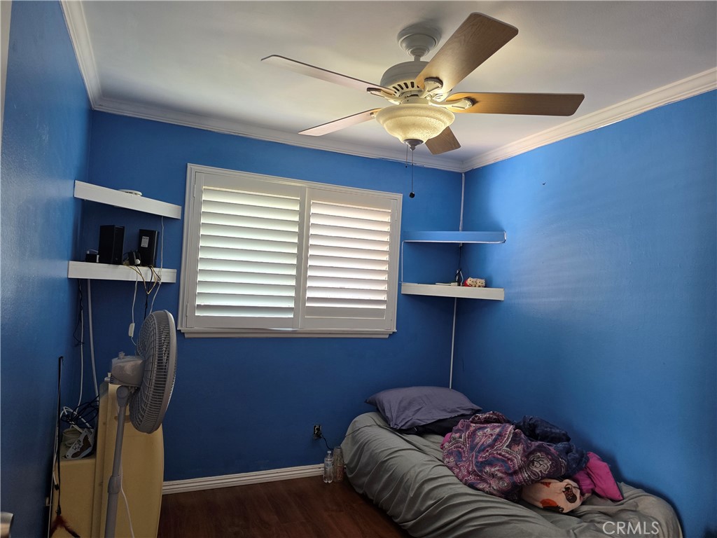 11219 Hood Way Stanton, CA 90680 - Photo 15 of 21 a bedroom with furniture and a window