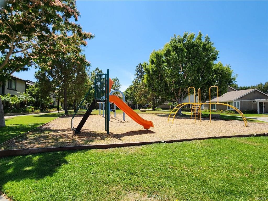 11219 Hood Way Stanton, CA 90680 - Photo 19 of 21 a view of a backyard with a slide