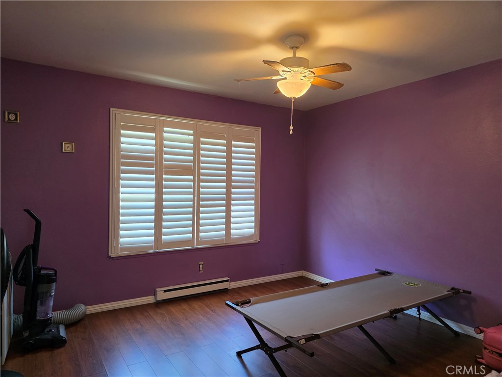 11219 Hood Way Stanton, CA 90680 - Photo 9 of 21 a view of a workspace with furniture and a window