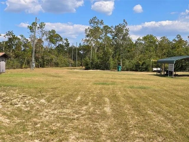a garden view with a seating space